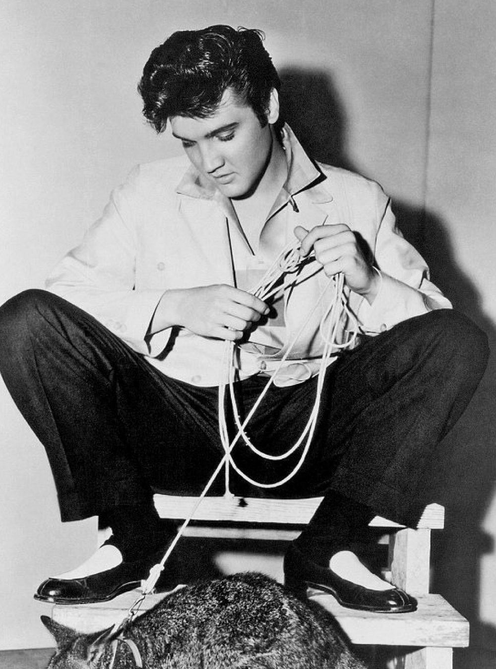 Elvis wearing white loafers
